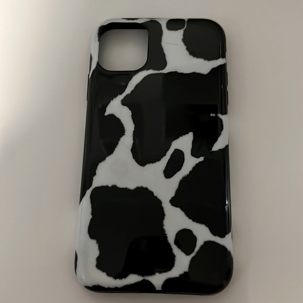 Casetify cow print case for Iphone 11 and 12 in great condition